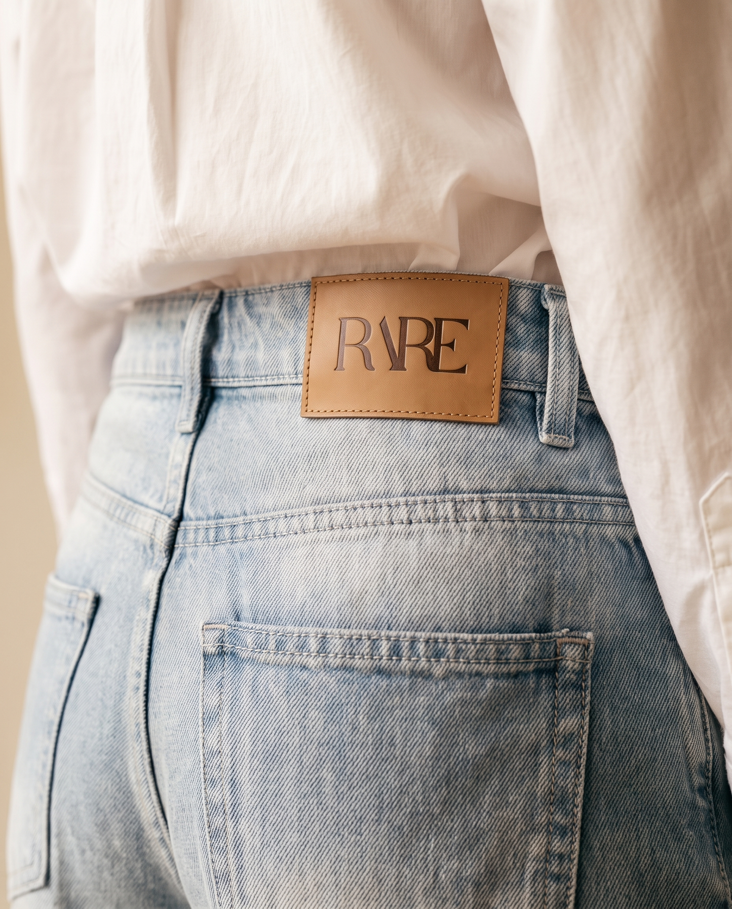 RARE Pearl palest blue jeans, back waistband detail with the tan leather RARE patch