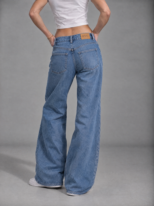RARE Opal light blue jeans, back view with tan leather RARE patch