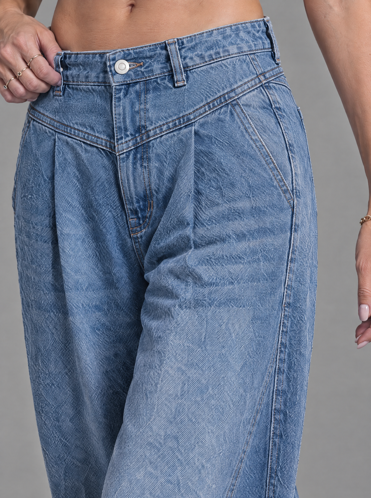 RARE Opal jeans, close-up of double waistband, pleats and denim