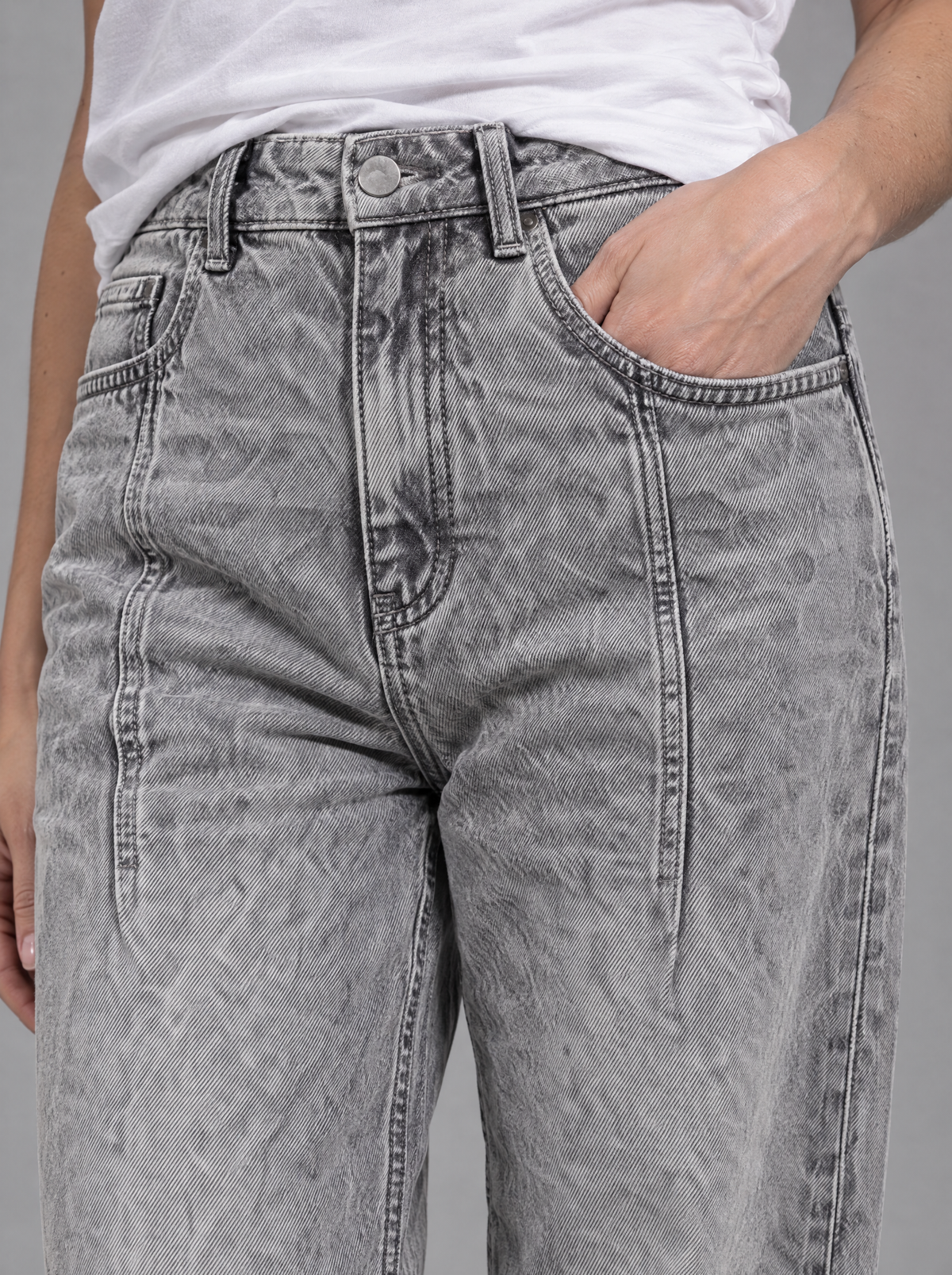 RARE Quartz jeans, close-up of grey acid wash denim